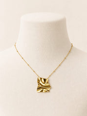 Noura Necklace — Gold tone