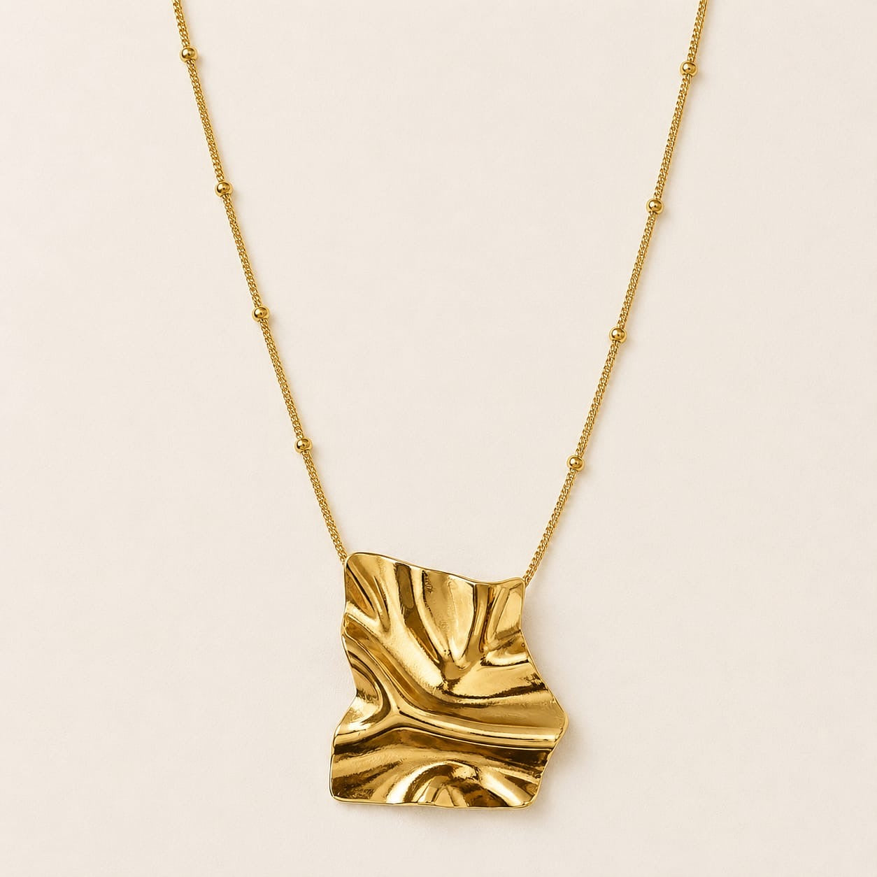 Noura Necklace — Gold tone